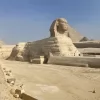An Egypt Tour Reviewer taking a picture inside one of the Egyptian landmarks
