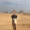 An Egypt Tour Reviewer taking a picture inside one of the Egyptian landmarks
