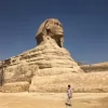 An Egypt Tour Reviewer taking a picture inside one of the Egyptian landmarks