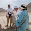 An Egypt Tour Reviewer taking a picture inside one of the Egyptian landmarks