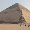 An Egypt Tour Reviewer taking a picture inside one of the Egyptian landmarks