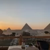 An Egypt Tour Reviewer taking a picture inside one of the Egyptian landmarks