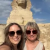 An Egypt Tour Reviewer taking a picture inside one of the Egyptian landmarks
