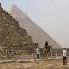An Egypt Tour Reviewer taking a picture inside one of the Egyptian landmarks