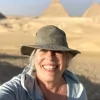 An Egypt Tour Reviewer taking a picture inside one of the Egyptian landmarks