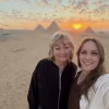 An Egypt Tour Reviewer taking a picture inside one of the Egyptian landmarks
