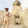 An Egypt Tour Reviewer taking a picture inside one of the Egyptian landmarks