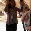 An Egypt Tour Reviewer taking a picture inside one of the Egyptian landmarks