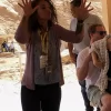 An Egypt Tour Reviewer taking a picture inside one of the Egyptian landmarks