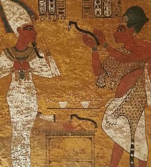Depiction of Tutankhamun’s successor, Aye, right, performing the Opening of the Mouth ceremony on Tut 