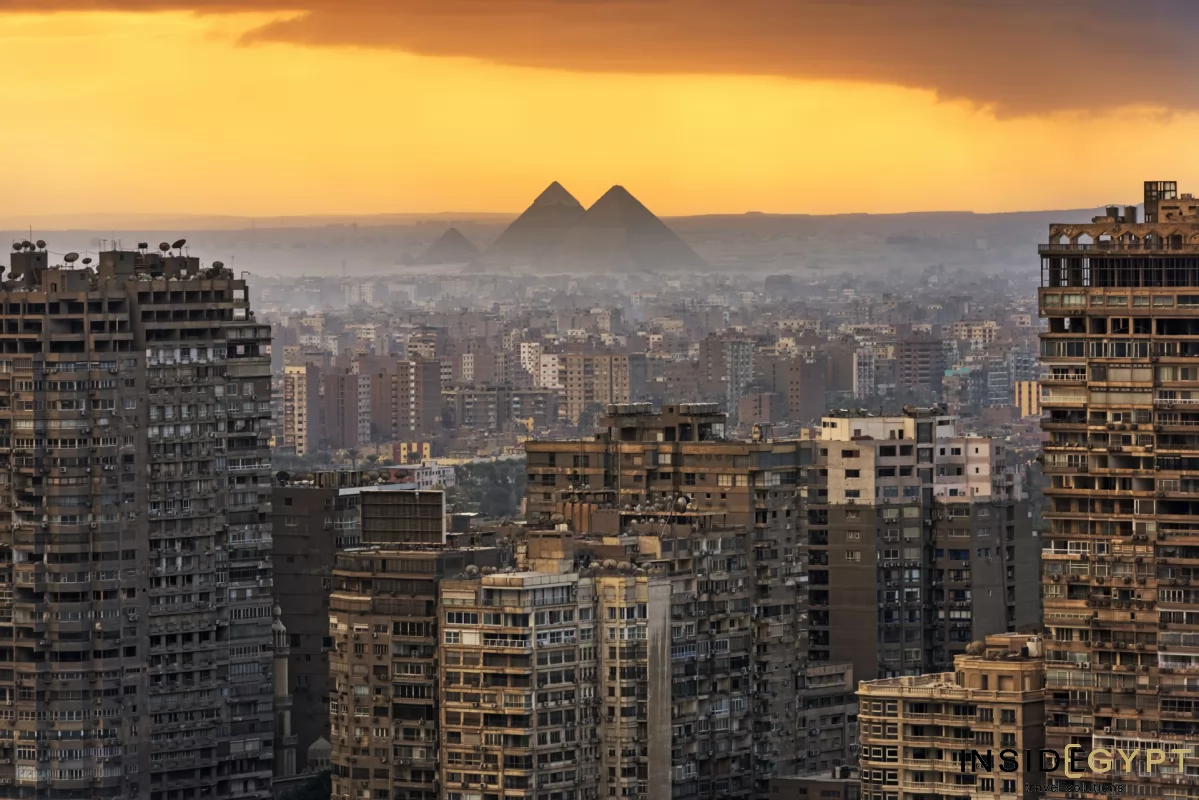 Cairo's sunset with the Giza Pyramids in the background
