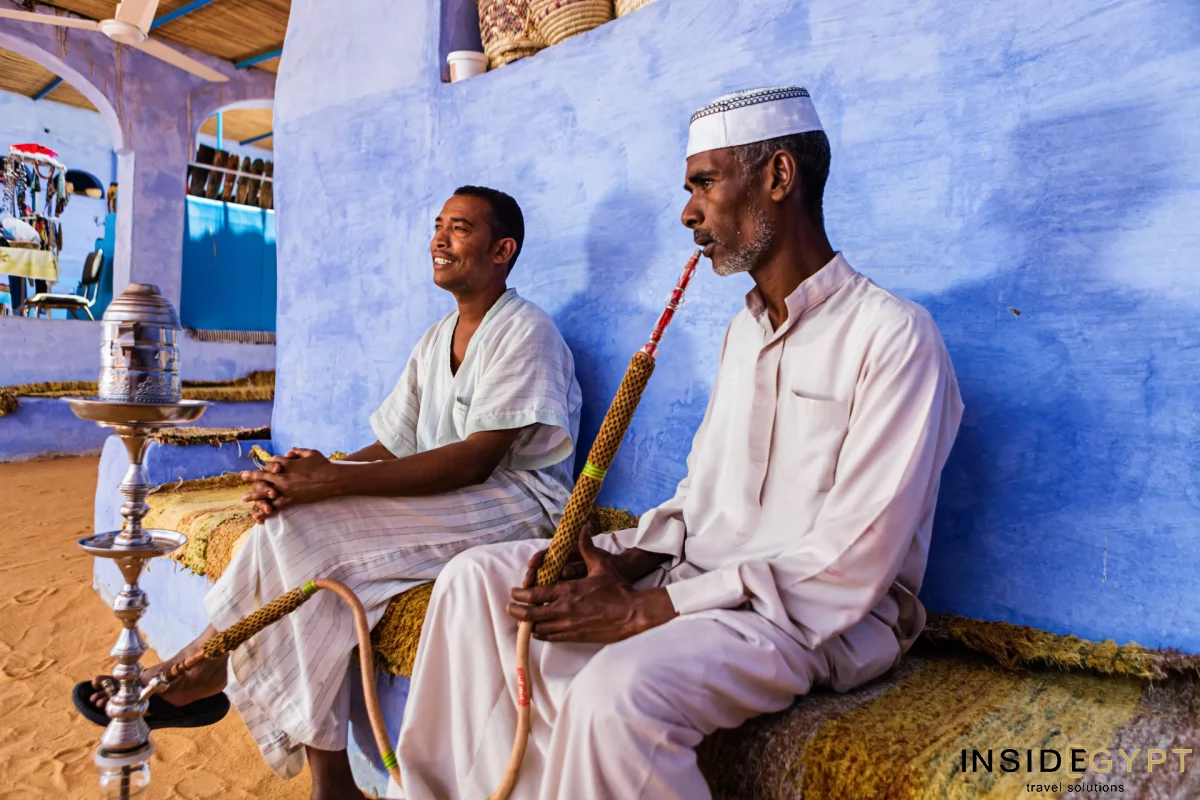 A man smoking a hookah in a Nubian village in Aswan. 