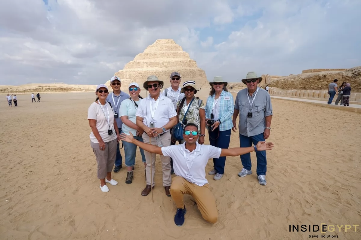 Group of American tourists in front Step Pyramid in Saqqara