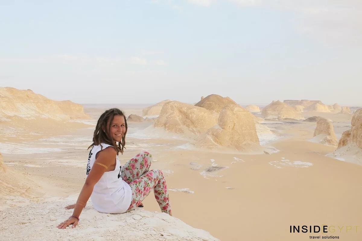 Tourist posing for picture in Egypt's White Desert