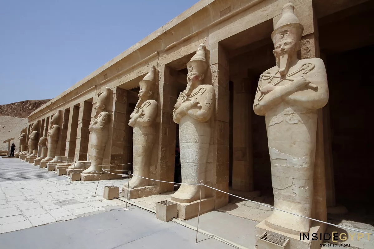 Large statues at the front of Queen Hatshepsut's temple in the valley of the Queens in Luxor