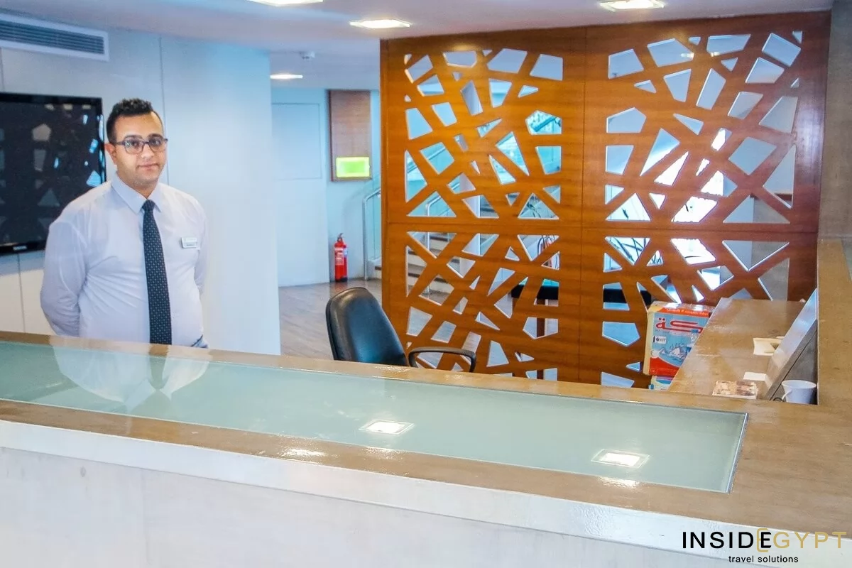 Nile Cruise crewmember standing near the reception