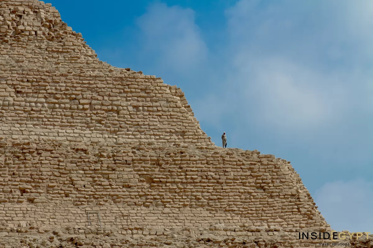 Men on the top of the Step Pyramid of Djoser