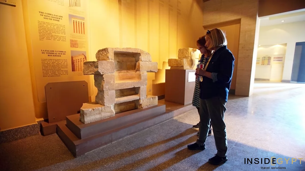 Two tourists inside the Imhotep Museum 