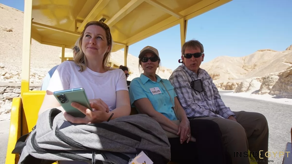 Inside Egypt tour participants inside a yellow tuf-tuf